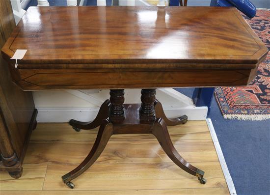 A Regency inlaid mahogany card table, W.92cm